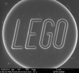 Lego at 57x. The gray scale is typical of unprocessed SEM imaging